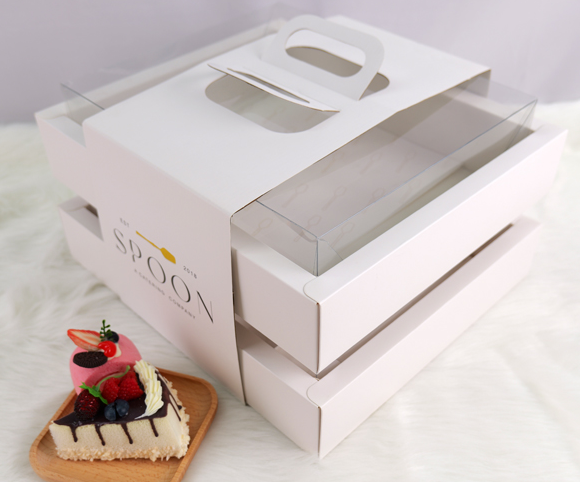 Innovative Double-Layer Cake Boxes with Handles Redefine Bakery Packaging for Safe Transport & Elegant Presentation
